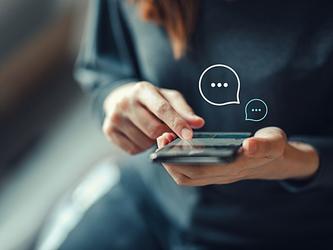 Woman using social media on smartphone